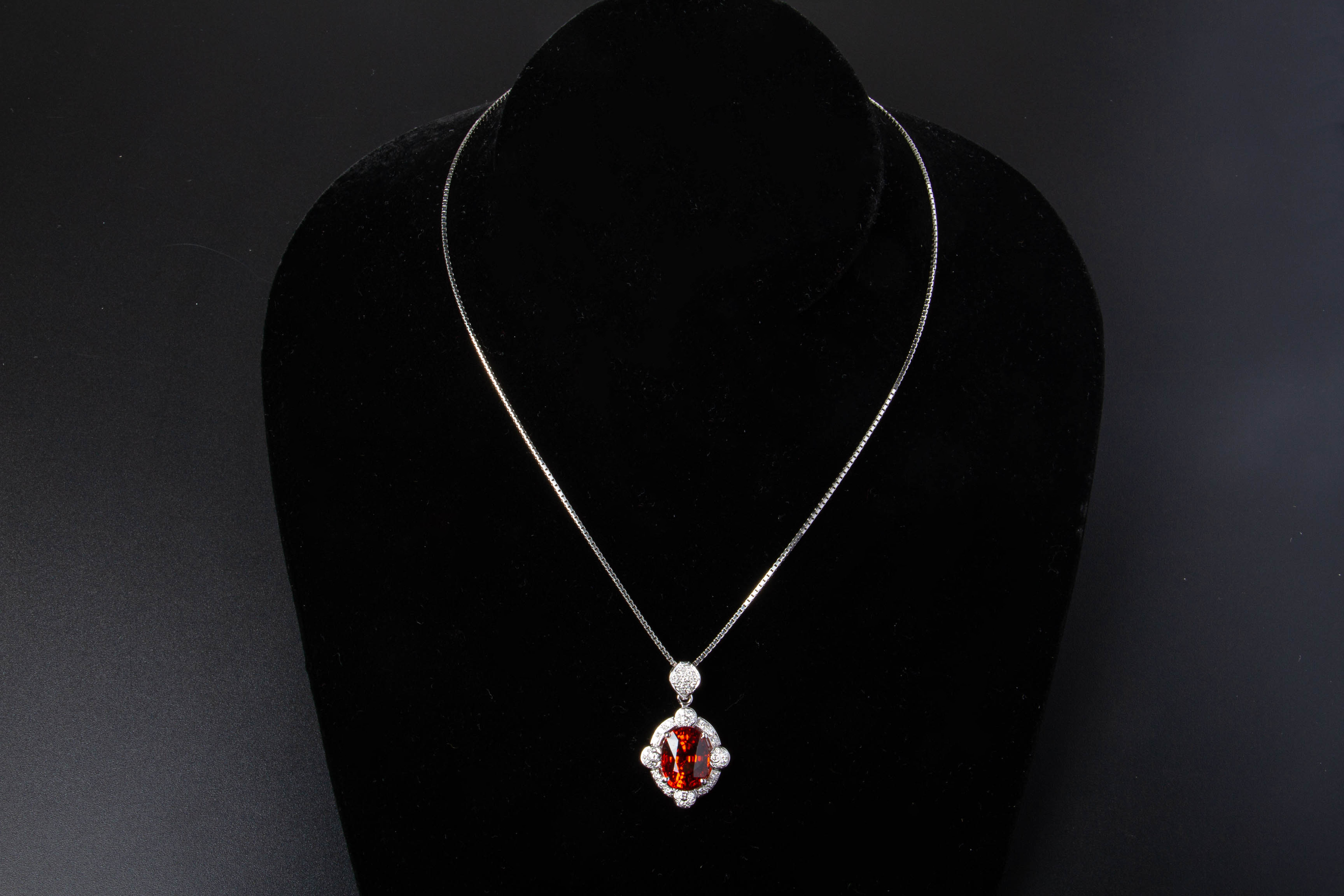 A SPESSARTINE GARNET AND DIAMOND PENDANT ON CHAIN - Image 2 of 3