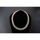 A CULTURED PEARL TWO STRAND NECKLACE BY MIKIMOTO