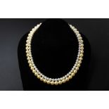 A TWO STRAND CULTURED PEARL NECKLACE
