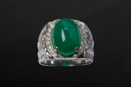 A COLOMBIAN EMERALD AND DIAMOND RING