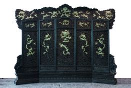 A LARGE CARVED HARDWOOD AND JADE INSET SCREEN
