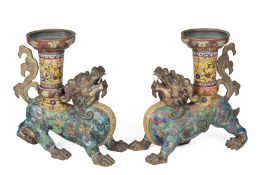A PAIR OF CLOISONNE ENAMEL MYTHICAL BEASTS