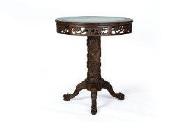 A CARVED AND MARBLE INSET HARDWOOD OCCASSIONAL TABLE