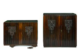A CHINESE TWO SECTION CARVED HARDWOOD CABINET