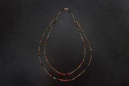 A SILVER GILT AND MULTI-GEM SET LONG NECKLACE BY DAVE