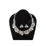 A SWAROVSKI NECKLACE AND EARRINGS SET