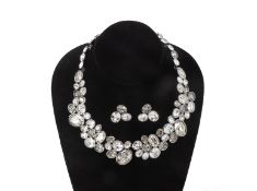 A SWAROVSKI NECKLACE AND EARRINGS SET
