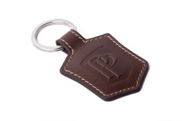 A PATEK PHILIPPE BROWN LEATHER KEY HOLDER