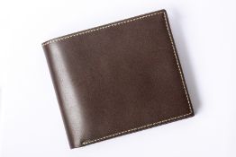 AN AUDEMARS PIGUET BROWN LEATHER WALLET