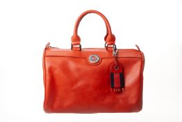 A LONGCHAMP CORAL ORANGE HANDBAG