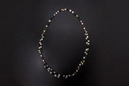 A CHANEL LAYERED GLASS BEADED NECKLACE