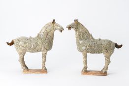 A PAIR OF TANG STYLE MARBLED POTTERY HORSES