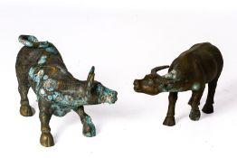 TWO SIMILAR METALWARE MODELS OF OXEN