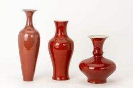 THREE CHINESE RED GLAZED PORCELAIN VASES