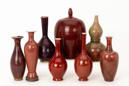 A GROUP OF EIGHT CHINESE MONOCHROME GLAZED VASES