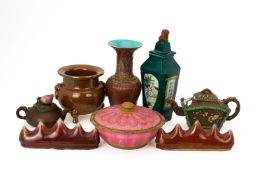 A GROUP OF EIGHT CHINESE POTTERY AND PORCELAIN ITEMS