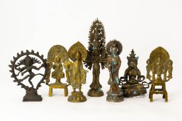 A GROUP OF SEVEN CAST METAL BUDDHIST FIGURES