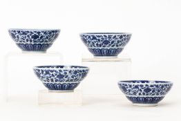 A SET OF FOUR SMALL BLUE AND WHITE PORCELAIN BOWLS