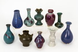 A GROUP OF TEN ASSORTED SMALL CHINESE CERAMIC VASES