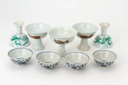 A GROUP OF NINE CHINESE PORCELAIN STEM CUPS AND TEA BOWLS