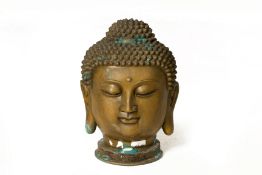 A LARGE METALWARE BUDDHA HEAD
