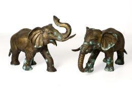 A PAIR OF LARGE METALWARE MODELS OF ELEPHANTS