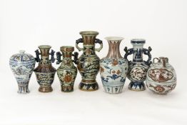 A GROUP OF SEVEN UNDERGLAZE RED AND BLUE VASES