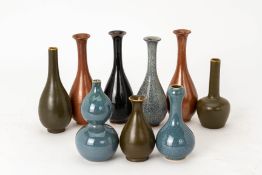 A GROUP OF NINE SMALL CHINESE PORCELAIN VASES