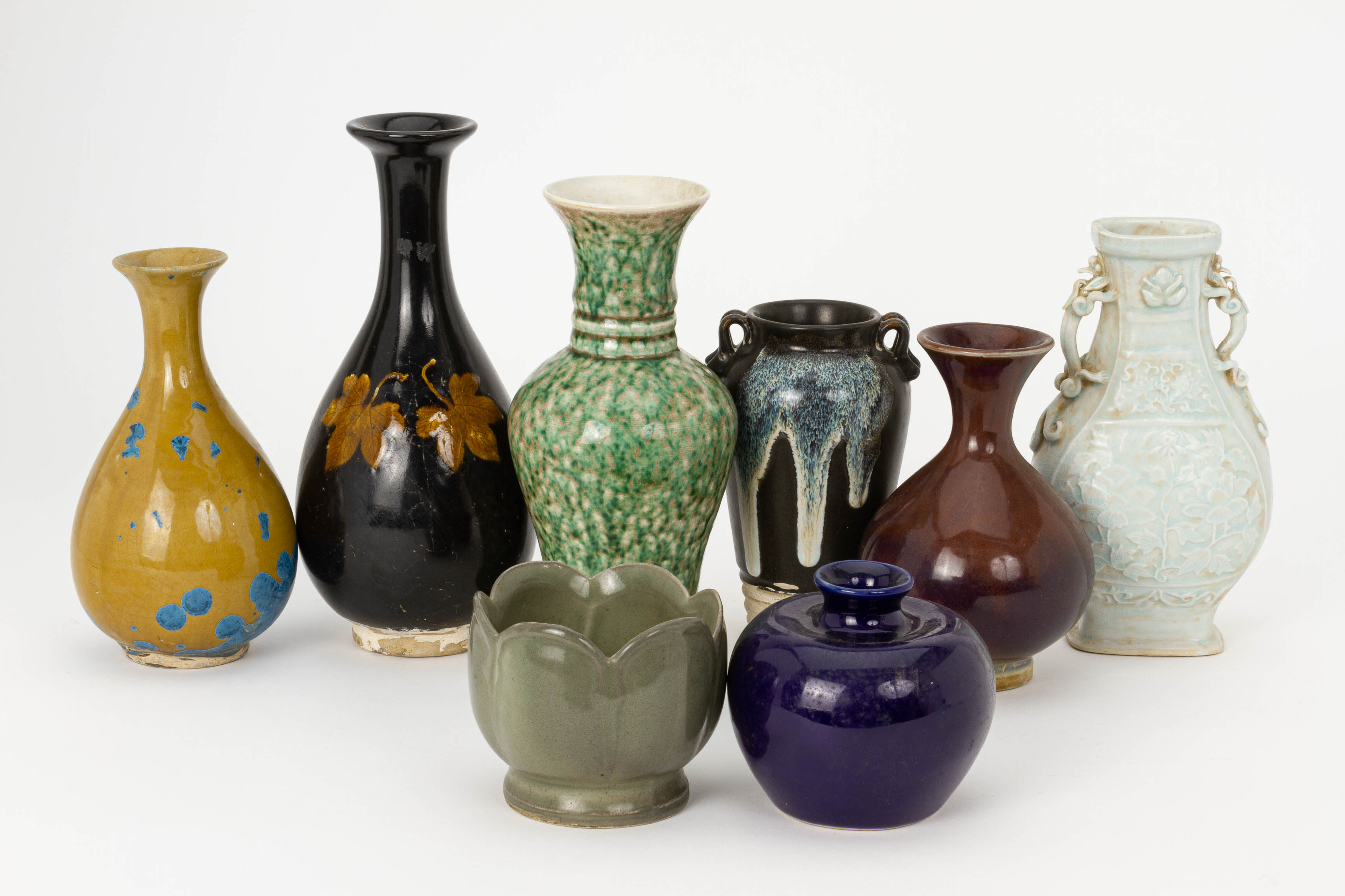 A GROUP OF EIGHT ASSORTED CHINESE CERAMIC VASES