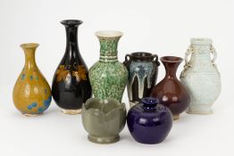 A GROUP OF EIGHT ASSORTED CHINESE CERAMIC VASES