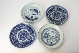 FOUR BLUE AND WHITE PORCELAIN CHARGERS