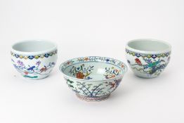 A PAIR OF DOUCAI PLANTERS AND A PORCELAIN BOWL