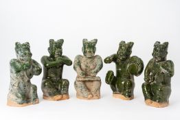 A SET OF FIVE GREEN GLAZED FIGURES OF MUSICIANS