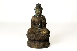 A LARGE METALWARE SEATED FIGURE OF GUANYIN