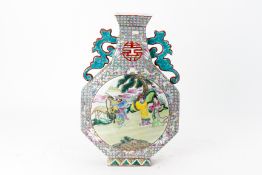 A TWIN HANDLED FAMILLE ROSE HEXAGONAL MOON FLASK