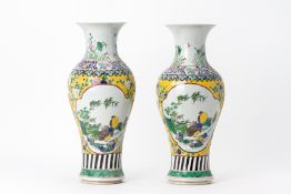 A PAIR OF FAMILLE ROSE BALUSTER PORCELAIN VASES