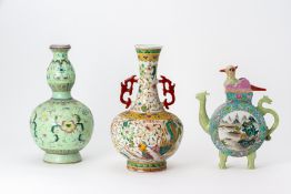 A GROUP OF POLYCHROME ENAMELLED VASES