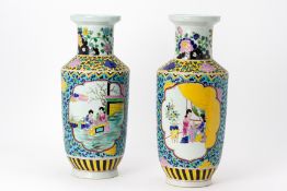 A PAIR OF FAMILLE ROSE ROULEAU VASES