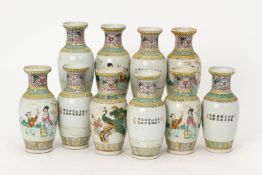 A GROUP OF TEN SIMILAR SMALL FAMILLE ROSE VASES