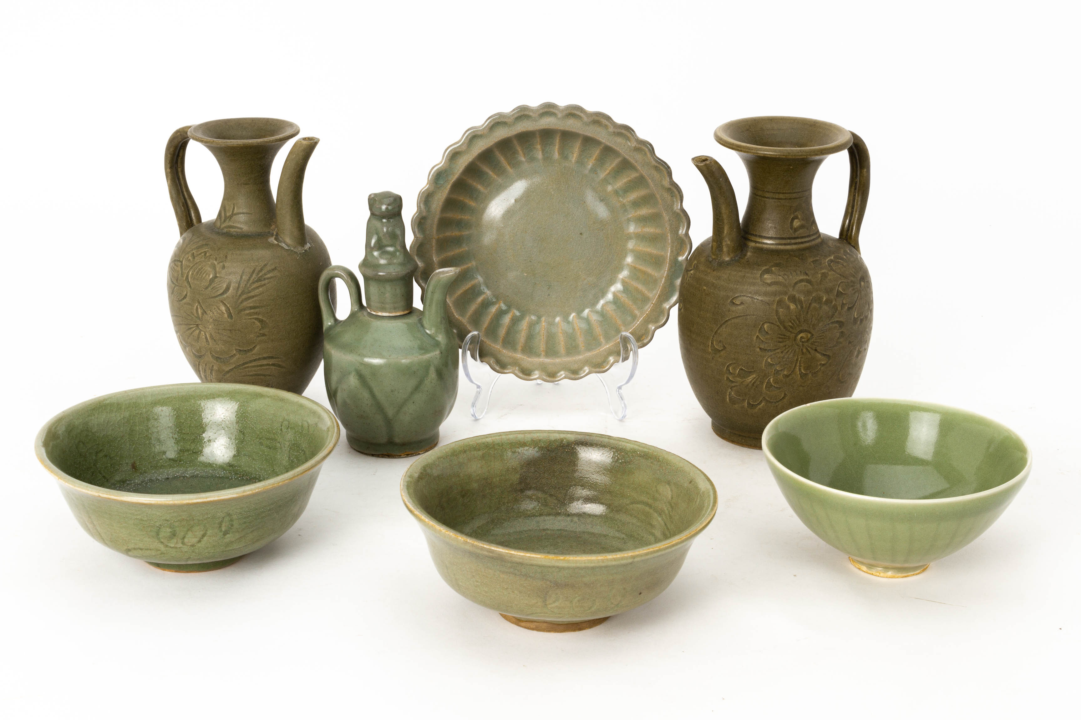 A GROUP OF SEVEN CELADON GLAZED ITEMS