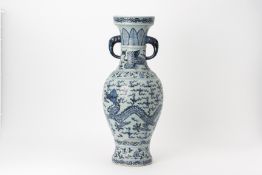 A LARGE MING STYLE BLUE AND WHITE TWIN HANDLED VASE