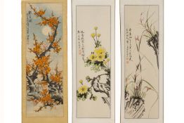 A GROUP OF THREE CHINESE SCROLLS OF FLOWERS AND FOLIAGE