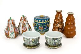 A GROUP OF SEVEN POLYCHROME DECORATED CERAMIC ITEMS