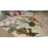 Lot of Chromed and Brass war time era Planes some with stands.