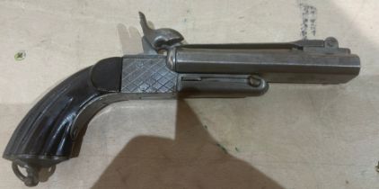 Antique Double Barrel Pistol with folding Bayonet.