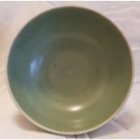 A Green Celadon Crackle Glazed Footed Bowl - 17cm diameter and 10cm tall.