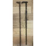 Antique Blackwood Carpenters depiction Walking Stick - 33 1/2" and other Wooden Foot Head Stick 34".