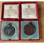 Duo of Vintage Boxed Lifesaving Medals - largest 32mm diameter.