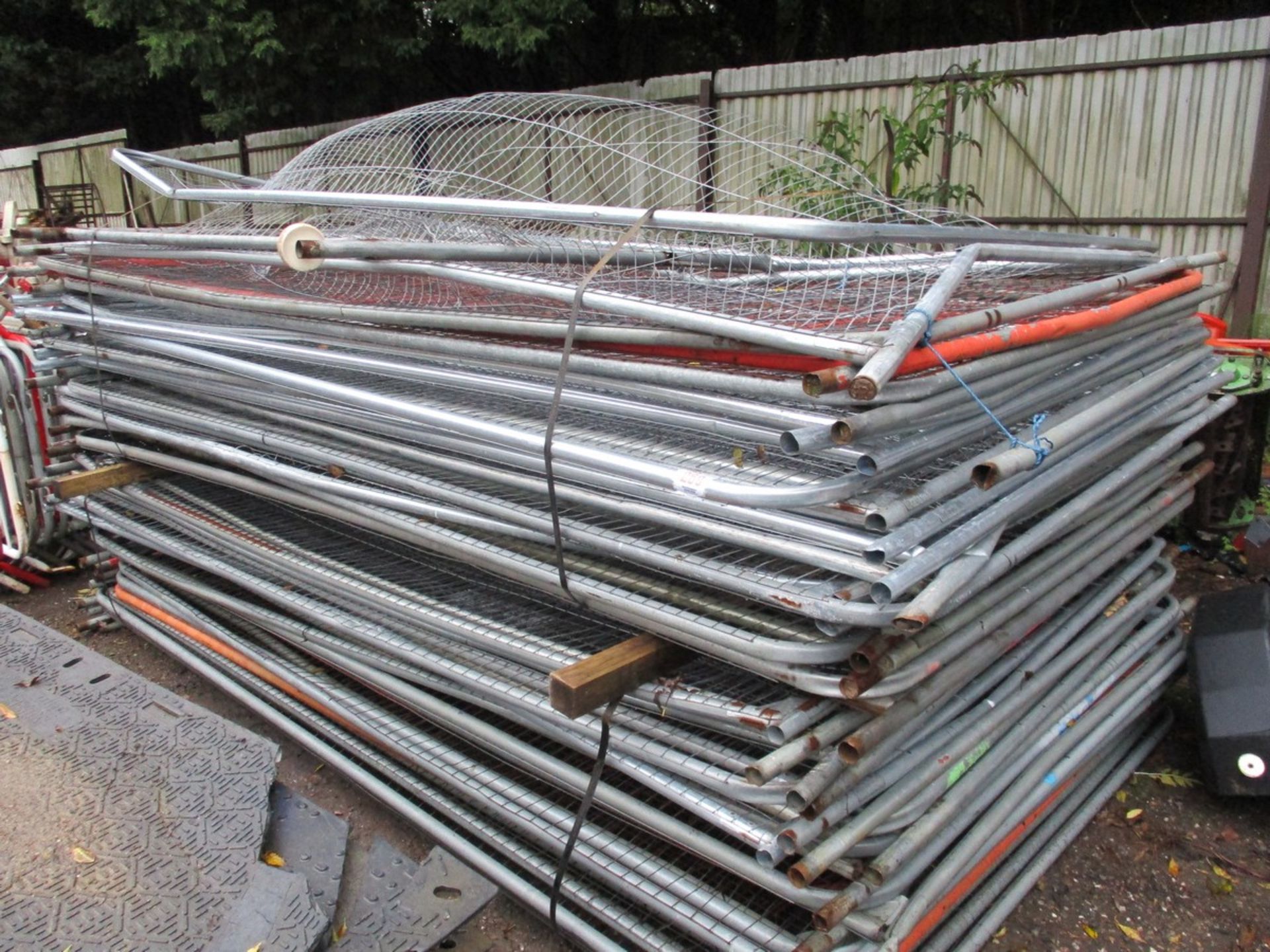 STACK OF HERAS FENCE PANELS