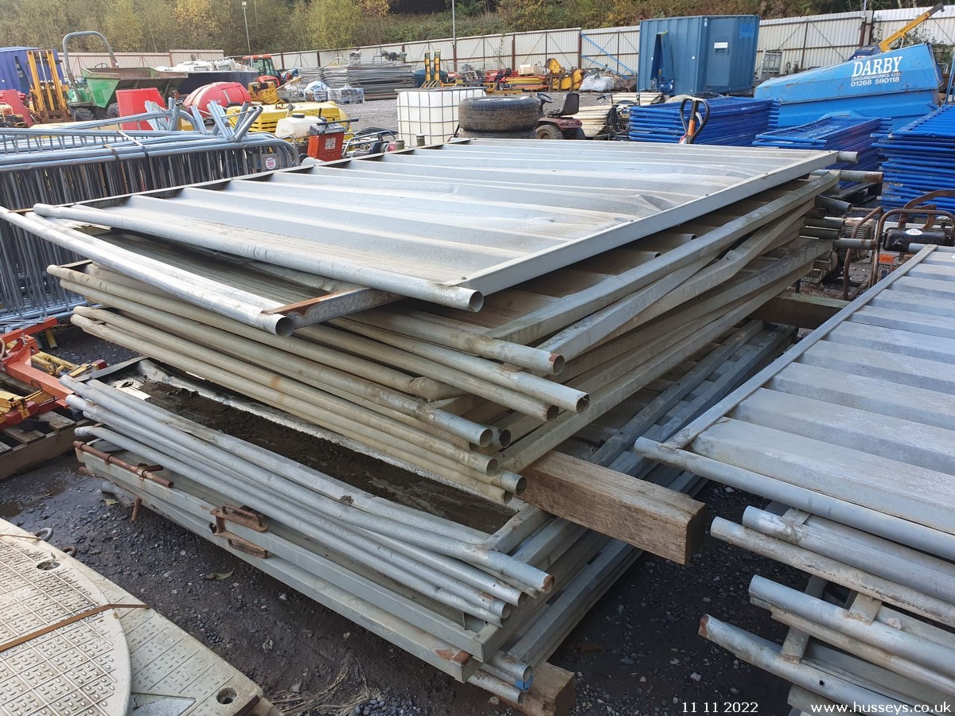 STACK OF SOLID FENCE PANELS